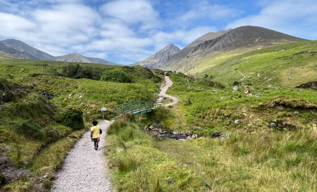 Highest peak of Ireland - Carrauntoohil visible afar from the hike path of the peak